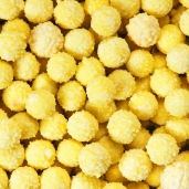 69.Riccetti gialli - Perline di zucchero arricciate (scatola da 1kg.)